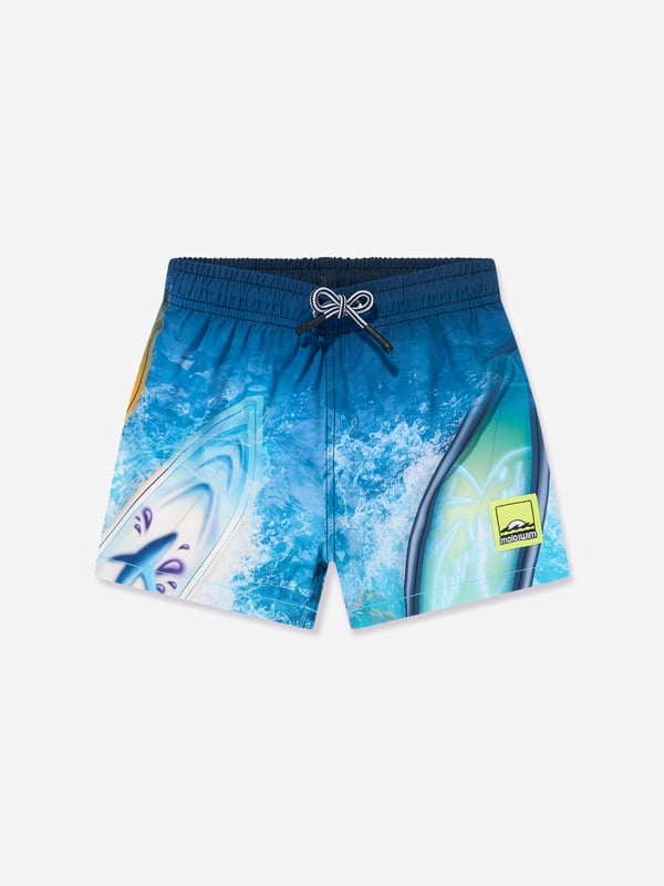Dive into summer with the exquisite Boys Niko Surf Art Chill Swim Shorts in Blue UPF50 from molo, a splendid addition to your young gentleman's SS2025 wardrobe. Perfect for both style and sun safety, these shorts are an essential piece for any beach escape or poolside retreat. Striking Surf Art Design Features a vibrant and eye-catching blue surf print that captures the essence of youthful adventure. Sun Protection Crafted with UPF50 fabric to shield delicate skin from harmful rays. Supreme Comfort Tailored from premium soft materials, ensuring all-day comfort and ease of movement. Durable Quick-Drying Ideal for continuous wear and aquatic activities.Adorn your child in molo's signature charm and unmatched quality. Order now for a stylish and safe summer!