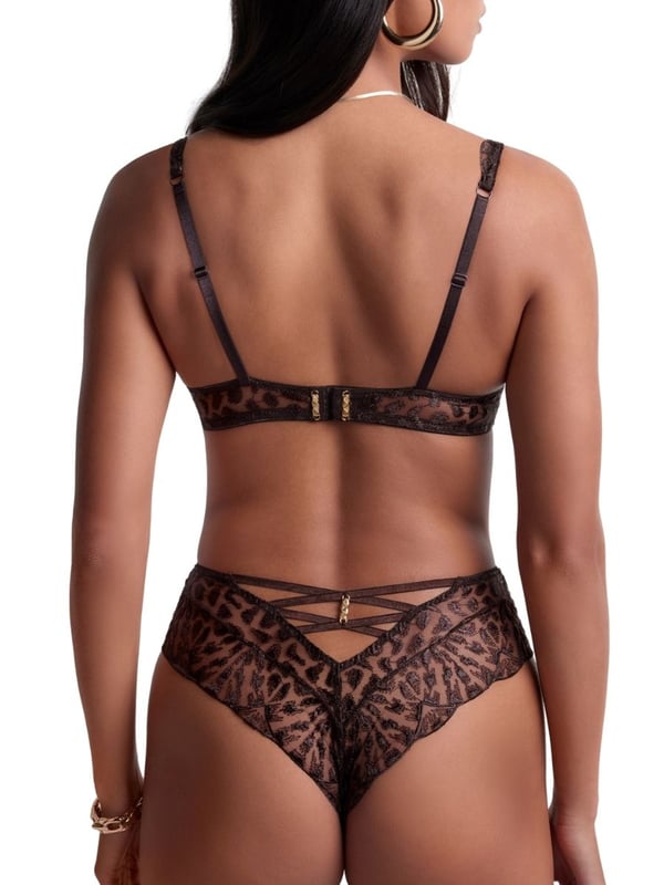 Aubade Crazy In Love Half Cup Bra. Underwired half cup bra with a cleavage enhancing neckline, shimmering animal print embroidery and golden zamak hardware. Matching briefs available. This item is recommended for hand wash only.