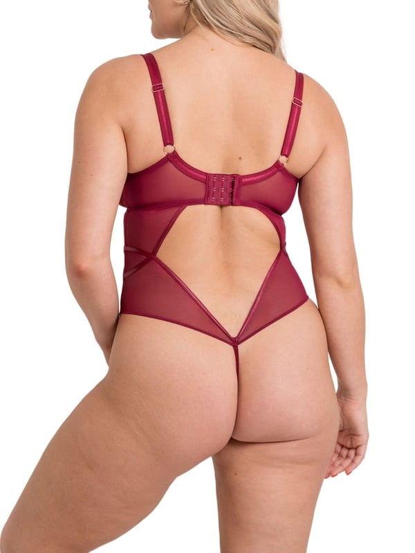 Curvy Kate Scantilly Suspense Plunge Bodysuit. Underwired non-padded plunge bodysuit with sheer mesh cups, contouring satin panels and rose gold hardware. This product is recommended as hand wash only.