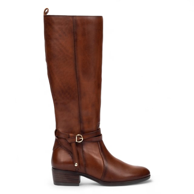 Step confidently into timeless style with the Pikolinos Daroca tall boots, expertly crafted from 100% calfskin leather for a polished, rich finish. Designed to offer exceptional comfort with a cushioned insole and a supportive 4 cm (1.57”) heel, these boots strike the perfect balance between form and function. The sleek, equestrian-inspired silhouette is accented with elegant strap and buckle detailing, making them a versatile wardrobe essential for cooler seasons.

Key Features:

Upper: 100% premium calfskin leather for durability and a refined look
Inner lining: Soft textile and pigskin blend (75% textile, 25% pigskin) for breathable, all-day comfort
Insole: Cushioned insole for enhanced walking support
Sole: 100% synthetic for long-lasting wear
Closure: Side zip fastening for easy wearability
Heel height: 4 cm (1.57”) for subtle elevation
Shaft contour: 38 cm (14.96”) based on EU size 37
Shaft height: 37.5 cm (14.76”) based on EU size 37