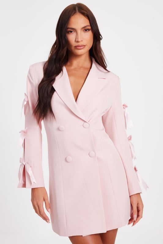- Double breasted - Bow sleeves - Button front - Tailored look - Model height: 5'6" - Model wears uk 8 / us 4 / eur 36 - Always check the wash care label - Cool hand wash with mild detergent