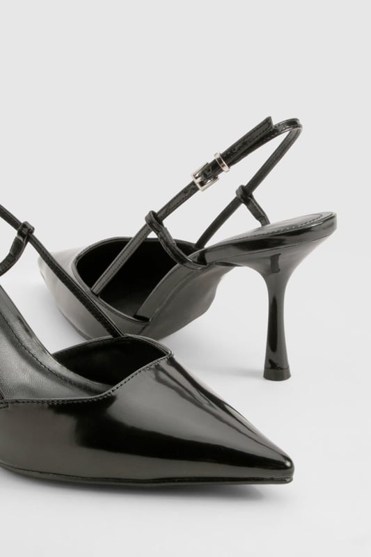 Sleek pointed toe design for a sophisticated look
        Slingback strap with adjustable buckle for a secure fit
        Low heel height between 2.5 and 4.5cm for comfortable wear
        Glossy finish adds a touch of glamour
        Versatile style suitable for various occasions
    
    Step out in style with these chic PU pumps from Boohoo. Perfect for the fashion-forward woman who wants to make a statement, these slingbacks combine comfort with elegance. The pointed toe and sleek silhouette create a flattering look that elongates the leg, while the low heel ensures you can dance the night away without compromising on style. Ideal for a night out with friends, these pumps can easily transition from drinks at the bar to hitting the dance floor. Pair them with your favourite little black dress for a classic look, or add a pop of edge to tailored trousers for a more contemporary ensemble. The adjustable strap allows for a customised fit, ensuring these pumps will be your go-to choice for any urban nightlife adventure.