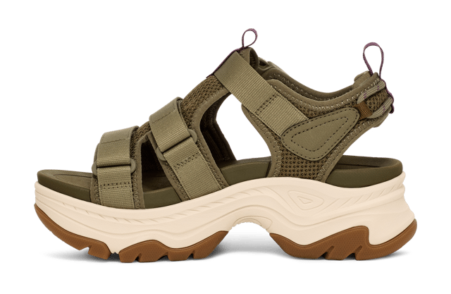 TEVA WOMENS HURRICANE AMPSOLE GAILA BURNT OLIVE An elevated platform sandal that features outdoor-inspired design details, the Hurricane Ampsole Gaila takes our iconic Hurricane to new heights with a fresh bottom unit inspired by mountain peaks. We’ve doubled down on comfort features, lining our quick-dry straps with extra padding, adding a chunky, rubberized sole for toothy traction, and finishing with a ticked rope on the heel that ties back to our river roots