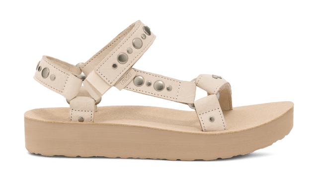 Amp up your summer with this metallic studded stunner. Cut from premium leather, our ultra-soft straps have been embellished with studs and paired with a cushy EVA footbed and roam-ready rubber sole to tackle wherever the day takes you