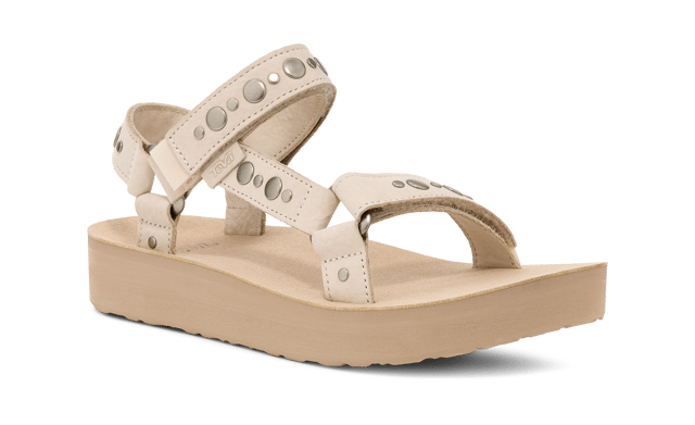 Amp up your summer with this metallic studded stunner. Cut from premium leather, our ultra-soft straps have been embellished with studs and paired with a cushy EVA footbed and roam-ready rubber sole to tackle wherever the day takes you