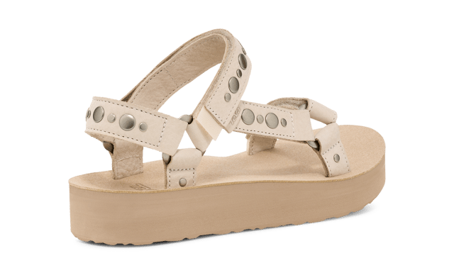 Amp up your summer with this metallic studded stunner. Cut from premium leather, our ultra-soft straps have been embellished with studs and paired with a cushy EVA footbed and roam-ready rubber sole to tackle wherever the day takes you