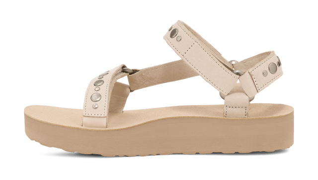 Amp up your summer with this metallic studded stunner. Cut from premium leather, our ultra-soft straps have been embellished with studs and paired with a cushy EVA footbed and roam-ready rubber sole to tackle wherever the day takes you