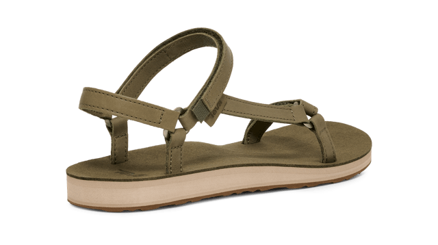 TEVA WOMENS ORIGINAL UNIVERSAL SLIM LEA BURNT OLIVE A minimalist style made for everyday wear, this silhouette cues up luxe leather straps to deliver a sleek, strappy summer sandal. A pared-back version of Teva’s timeless adventure icon, this update is ready to tackle sunshine-filled adventures.