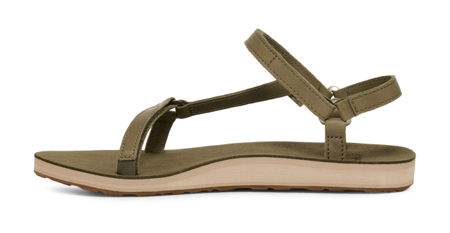 TEVA WOMENS ORIGINAL UNIVERSAL SLIM LEA BURNT OLIVE A minimalist style made for everyday wear, this silhouette cues up luxe leather straps to deliver a sleek, strappy summer sandal. A pared-back version of Teva’s timeless adventure icon, this update is ready to tackle sunshine-filled adventures.