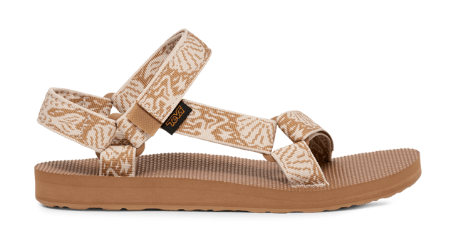 TEVA WOMENS ORIGINAL UNIVERSAL SIRENA TANZINE From a Grand Canyon raft in 1984 to docks, stoops, and sidewalks around the world, one of Teva’s very first sandal stands as a testament to timeless comfort and utilitarian style.