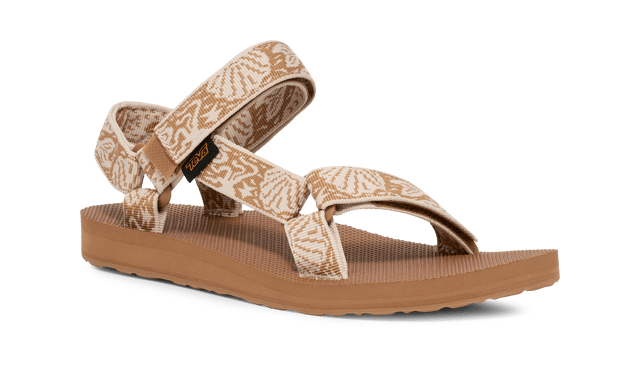 TEVA WOMENS ORIGINAL UNIVERSAL SIRENA TANZINE From a Grand Canyon raft in 1984 to docks, stoops, and sidewalks around the world, one of Teva’s very first sandal stands as a testament to timeless comfort and utilitarian style.