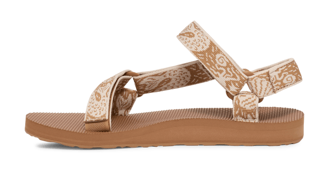 TEVA WOMENS ORIGINAL UNIVERSAL SIRENA TANZINE From a Grand Canyon raft in 1984 to docks, stoops, and sidewalks around the world, one of Teva’s very first sandal stands as a testament to timeless comfort and utilitarian style.
