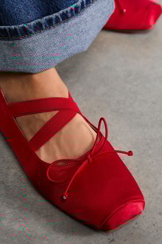 Luxurious satin finish Mary Jane ballet pumps with elegant square toe design
        Distinctive cross-strap detail with delicate tie fastening for adjustable fit
        Flat heel measuring between 0-2cm for all-day comfort and wearability
        Versatile regular fit suitable for various foot shapes
        Sleek silhouette that transitions effortlessly from day to evening occasions
    
    Faith's Monique ballet pumps reimagine the classic Mary Jane with contemporary flair. The lustrous satin finish and modern square toe create a refined aesthetic that works beautifully with both casual and dressier ensembles. Style these versatile flats as seen on our model - paired with relaxed denim and a crisp white top under a tailored blazer for an effortless smart-casual look. The cross-strap detail with tie fastening adds a feminine touch whilst ensuring a secure fit. Perfect for family gatherings, weekend brunches or office days when comfort cannot be compromised. The flat heel provides stability without sacrificing style, making these pumps an ideal choice for occasions requiring extended wear. Add these to your collection for a chic alternative to trainers that still delivers on comfort and sophistication.
