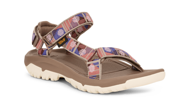 TEVA WOMENS HURRICANE XLT2 SUNSET SIMPLY TAUPE An infinitely versatile sandal, the Hurricane XLT2 is outfitted for grippy traction while keeping you comfortable. Employing 100% REPREVE® recycled polyester straps and supportive midsole, our iconic sport sandal is up for any adventure.