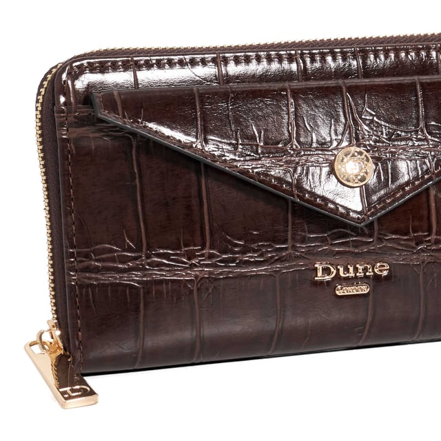 Crafted from high-shine black material, the Keyfield purse is as sleek as it is practical. Designed with a zip-around closure, it opens to reveal card slots, two spacious compartments, and a central zip pocket'perfect for keeping essentials organised. A monogrammed lining adds a signature touch, while the front pocket and branded press stud offer extra functionality and polish. Finished with our logo on the front, this everyday essential is elevated with thoughtful detail