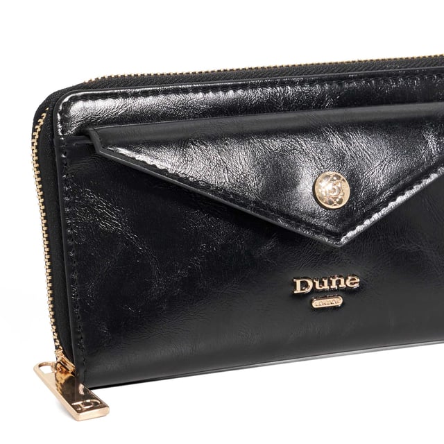 Crafted from high-shine black material, the Keyfield purse is as sleek as it is practical. Designed with a zip-around closure, it opens to reveal card slots, two spacious compartments, and a central zip pocket'perfect for keeping essentials organised. A monogrammed lining adds a signature touch, while the front pocket and branded press stud offer extra functionality and polish. Finished with our logo on the front, this everyday essential is elevated with thoughtful detail
