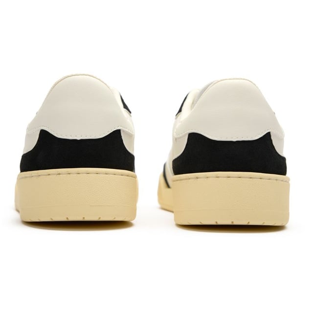 Good News steps up sustainability with the Mack trainer, a conscientious choice without compromising style. Cleverly crafted from agricultural waste and bio-vegetable materials, these white court-inspired kicks feature deadstock suede accents for a premium touch. The unique recycled rubber sole offers reliable grip, while a recycled foam insock delivers exceptional comfort. The branded tongue adds a subtle finishing touch to this vegan-friendly, eco-conscious design that proves ethical footwear can be effortlessly cool.