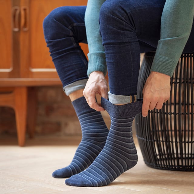 Gentle Grip - Mens 12 Value Pack Non Elastic Patterned Socks: If you're searching for a way to liven up your wardrobe and inject a burst of vibrancy, then these Gentle Grip Socks are just what you need. With loads of designs to choose from, like Plain, Argyle, Colourburst, Heel & Toe, and more. These socks are the perfect way to add personality to any outfit, while also providing the comfort and quality that Gentle Grip is known for. Indulge in luxurious comfort with Gentle Grip, crafted from premium quality cotton-rich yarn that feels as good as it looks. These socks are carefully designed to provide a superior fit that hugs your legs without causing any discomfort or unsightly constriction rings. The high-quality construction of these socks is built to last, ensuring that you can enjoy their softness and comfort for years to come. . These are available in 2 sizes: 6-11 UK & 12-14 UK, come in a range of great patterns and are a 12 pair value pack. They are made from: 76% Cotton, 19% Polyester, 3% Nylon, 2% Elastane and are Machine Washable. Extra Product Details: Men’s Gentle Grip Socks 12 Pair Value Pack Classic & Funky Patterns Bright Colour Options Non Elastic Top Soft Cotton Rich Fibres Soft Honeycomb Top Helps Aid Circulation Constructed With Care Over 20 Different Styles Available in 6-11 UK & 12-14 UK Machine Washable