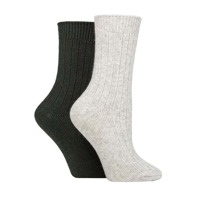 Wildfeet - Ladies 2 Pack Cashmere Bed Socks: In a soft, cosy blend including luxury cashmere, natural wool and viscose, these ladies’ Wildfeet Cashmere Socks are the ideal accompaniment to your day, whether you’re out walking around in the cold or snuggled up at home on the sofa. The mix of wool & viscose (from bamboo) fibres are used to make these socks more practical and durable than cashmere alone, but maintain its breathability, insulating and moisture-managing abilities. They also have a ribbed leg for added comfort, and come as a twin pack, have a medium gauge thickness and are in a crew length, making them a great choice for all your leisure shoes and boots, bringing a little extra luxury and comfort to your every outfit. These two pairs of Wildfeet Cashmere Socks come attractively wrapped with a satin ribbon bow, which makes them ideal for gifting to friends or family. . Wild Feet is a range of socks featuring cool designs, bold colours and quirky catchphrases - from pugs and penguins, to lions and llamas! . There are 14 colours to choose from. They come in one size Ladies 4-8 UK, are made from 37% Wool, 27% Viscose, 24% Polyamide, 11% Cashmere, 1% Elastane and are machine washable. Extra Product Details: Ladies Wildfeet Bed Socks Wool & Cashmere Blend Fibres 14 Great Colour Options Made For Relaxing Ribbed Legs 2 Pairs Per Pack A Great Gift Idea The Ideal Stocking Filler