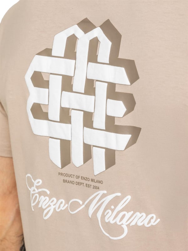 Stay stylish and comfortable with the Enzo Milano Men's Printed T-Shirt & Shorts Set. The cotton T-shirt features a bold puff print on the front and back, with a ribbed crew neck and regular fit for all-day ease. Paired with fleece-lined shorts, this set is perfect for casual days. The shorts offer a regular fit, elasticated waistband with drawstring, side pockets, and a matching puff print graphic for a standout look.