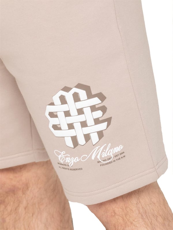 Stay stylish and comfortable with the Enzo Milano Men's Printed T-Shirt & Shorts Set. The cotton T-shirt features a bold puff print on the front and back, with a ribbed crew neck and regular fit for all-day ease. Paired with fleece-lined shorts, this set is perfect for casual days. The shorts offer a regular fit, elasticated waistband with drawstring, side pockets, and a matching puff print graphic for a standout look.