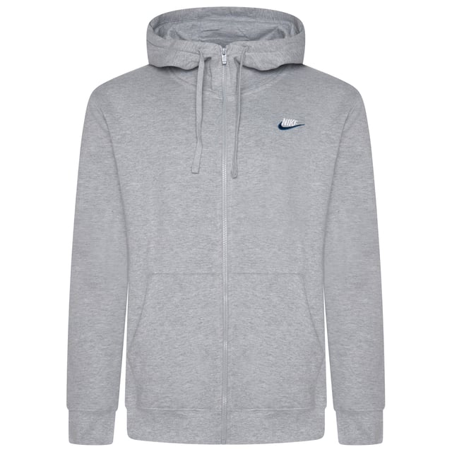 Layer up in this men's Foundation Tracksuit from Nike. In a Dark Grey Heather colourway, this matching set includes a full zip hoodie and standard fit joggers, both made from soft brushed fleece for all-day comfort. The hoodie features an adjustable drawstring hood, full-zip fastening, ribbed trims, and a split kangaroo pocket for essential storage. The joggers come with an elastic waistband and adjustable drawcord for a custom fit, ribbed ankle cuffs to maintain shape, and side pockets for convenience. Finished with signature Nike Swoosh embroidery to the chest and thigh for a classic look.