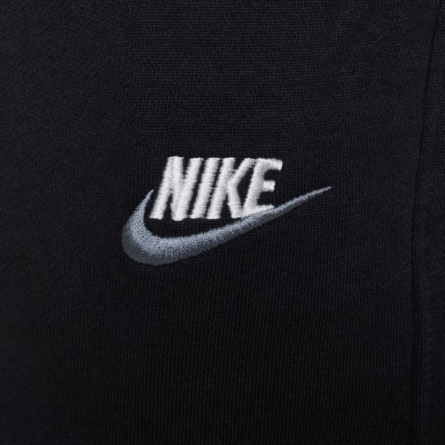 Layer up in this men's Foundation Full Zip Hoodie from Nike.  In a Black colourway, this relaxed-fit hoodie is made with soft brushed fleece for lasting comfort. It features a full-zip fastening with an adjustable drawstring through the hood for cosy coverage. It has stretchy ribbed trims to secure the fit, and a split kangaroo pocket up front to stash your essentials. Finished with signature Nike branding embroidered to the chest.