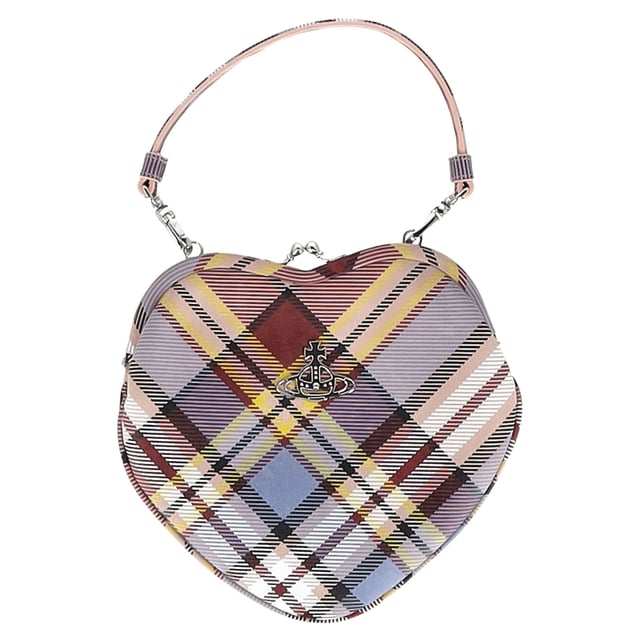 VINTAGE, RRP AS NEW
The Vivienne Westwood Belle Heart Clutch Bag in multicolor leather is a whimsical statement piece, featuring a sculptural heart shape and vibrant, artistic print that captures the brand’s avant-garde spirit. Crafted with smooth leather and finished with the signature Orb emblem, it’s both playful and luxurious. **Styling Tip:** Pair it with a minimalist dress or sleek jumpsuit to let the bag shine as your standout accessory.

 Vivienne Westwood Belle Heart Clutch Bag in Multicolor Leather

Condition: Excellent
Signs of wear: No retail tag, No visible sign of wear., 
Packaging: Dust bag
Color: Multicolor | multicolor
Material: Leather
Size: One Size | One Size
Measurements: Width: 10; Height: 180; Length: 200; Handle drop: 0; Strap length: 0
SKU: NAPPUGBBA487805W