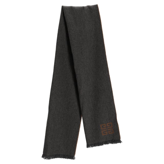 VINTAGE, RRP AS NEW
Wrap yourself in luxury with the Givenchy Monogram Fringed Reversible Scarf, crafted in soft wool and showcasing the iconic logo in versatile grey and brown tones. The reversible design offers two chic looks in one, finished with delicate fringe detailing for a touch of texture. **Styling tip:** Drape it over a tailored coat or belt it at the waist over a neutral sweater dress for effortless cold-weather sophistication.

Givenchy Monogram Fringed Reversible Scarf in Grey and Brown Wool

Condition: Excellent
Signs of wear:  No sign of wear.
Packaging: None
Color: Grey
Material: Wool
Size: One Size | One Size
Measurements: Height: 1840; Length: 450
SKU: TONPUDEAC507957W