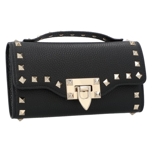 - Calfskin rockstud handbag by valentino garavani, grained leather design, beading made with the brand's iconic studs applied on front and back, front closure by swivel, iconic brand monogram printed in pressure and contrasting on back, removable chain shoulder strap, contrasting studded leather top handle.
- Made in Italy
- Dimensions: W 19 x H 10 x D 4 cm Measurments:  width: 40 mm length: 190 mm height: 100 mm