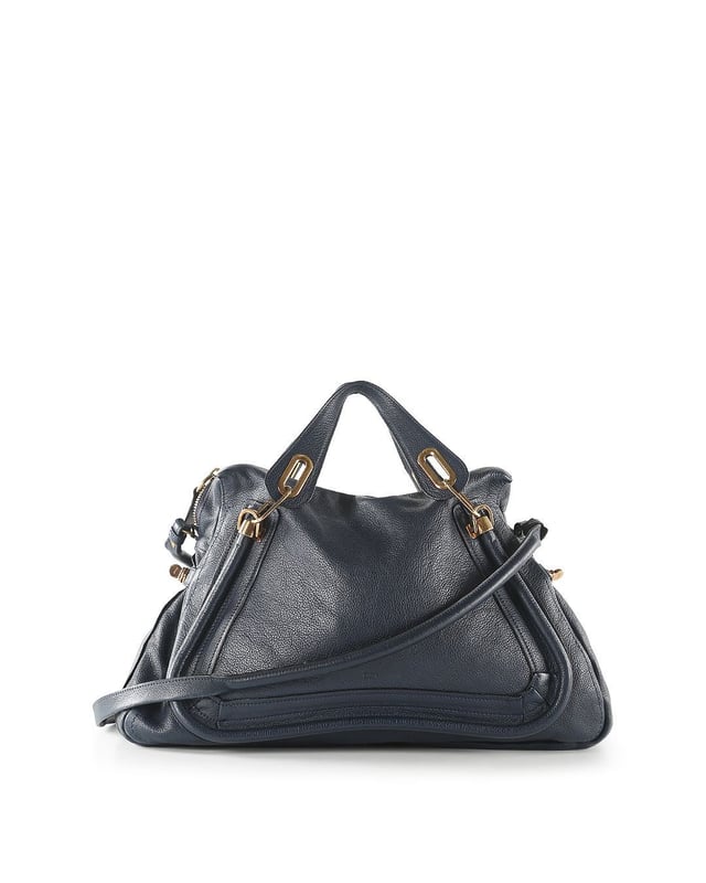 VINTAGE, RRP AS NEW
This Chloe bag is crafted from navy blue calfskin leather. The bag features double flat leather handles, detachable shoulder strap, front and back piped trim details, sides twist-locks can be unfastened to expand the bag, top zip closure, black canvas interior lined with a zipped pocket, and gold tone hardware. The bag is in very good condition, yet the shoulder strap is slightly creased and the back of the bag shows minor faded stains. The bottom of the bag and the bottom corners are slightly scuffed. The interior is intact. Product code: 03-11-50.
Chloe Chloe Blue Leather Paraty Shoulder Bag
Color: blue | navy blue
Material: Leather
Condition: very good
Size: One Size 
Sign of wear: No
SKU: 158169 / RWB-272 / RWB-272 
Dimensions:  Length: 460 mm, Width: 130 mm, Height: 350 mm
Chloe Chloe Blue Leather Paraty Shoulder Bag
Color: blue | navy blue
Material: Leather | Leather
Condition: very good
Size: One Size | One Size
Sign of wear: No
SKU: 444385 / RWB-272 / RWB-272 
Dimensions:  Length: 460 mm, Width: 130 mm, Height: 350 mm