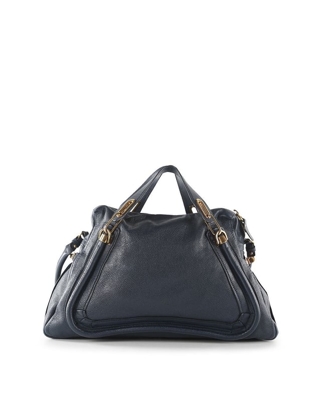 VINTAGE, RRP AS NEW
This Chloe bag is crafted from navy blue calfskin leather. The bag features double flat leather handles, detachable shoulder strap, front and back piped trim details, sides twist-locks can be unfastened to expand the bag, top zip closure, black canvas interior lined with a zipped pocket, and gold tone hardware. The bag is in very good condition, yet the shoulder strap is slightly creased and the back of the bag shows minor faded stains. The bottom of the bag and the bottom corners are slightly scuffed. The interior is intact. Product code: 03-11-50.
Chloe Chloe Blue Leather Paraty Shoulder Bag
Color: blue | navy blue
Material: Leather
Condition: very good
Size: One Size 
Sign of wear: No
SKU: 158169 / RWB-272 / RWB-272 
Dimensions:  Length: 460 mm, Width: 130 mm, Height: 350 mm
Chloe Chloe Blue Leather Paraty Shoulder Bag
Color: blue | navy blue
Material: Leather | Leather
Condition: very good
Size: One Size | One Size
Sign of wear: No
SKU: 444385 / RWB-272 / RWB-272 
Dimensions:  Length: 460 mm, Width: 130 mm, Height: 350 mm