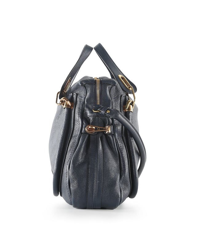VINTAGE, RRP AS NEW
This Chloe bag is crafted from navy blue calfskin leather. The bag features double flat leather handles, detachable shoulder strap, front and back piped trim details, sides twist-locks can be unfastened to expand the bag, top zip closure, black canvas interior lined with a zipped pocket, and gold tone hardware. The bag is in very good condition, yet the shoulder strap is slightly creased and the back of the bag shows minor faded stains. The bottom of the bag and the bottom corners are slightly scuffed. The interior is intact. Product code: 03-11-50.
Chloe Chloe Blue Leather Paraty Shoulder Bag
Color: blue | navy blue
Material: Leather
Condition: very good
Size: One Size 
Sign of wear: No
SKU: 158169 / RWB-272 / RWB-272 
Dimensions:  Length: 460 mm, Width: 130 mm, Height: 350 mm
Chloe Chloe Blue Leather Paraty Shoulder Bag
Color: blue | navy blue
Material: Leather | Leather
Condition: very good
Size: One Size | One Size
Sign of wear: No
SKU: 444385 / RWB-272 / RWB-272 
Dimensions:  Length: 460 mm, Width: 130 mm, Height: 350 mm