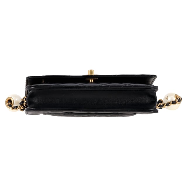 VINTAGE, RRP AS NEW
The Chanel Pearl Crush Mini Wallet on Chain in black diamond-quilted lambskin offers the perfect fusion of luxury and function. This coveted WOC features an adjustable leather-threaded gold chain, an aged gold CC turn-lock, and the signature “pearl” detail slider, allowing you to wear it long, short, or as a clutch. Inside, discover a gold-toned interior with card slots, a zip compartment, and space for essentials—all in one compact, statement piece.


Chanel Quilted CC Pearl Crush Mini Wallet on Chain in Black Lambskin Leather
Condition: Excellent
Signs of wear: No retail tag, No visible sign of wear., 
Packaging: None
Color: black
Material: Leather | Lambskin leather
Size: One Size | One Size
Measurements: Width: 30; Height: 130; Length: 190
SKU: MRPPUGBBA506535W