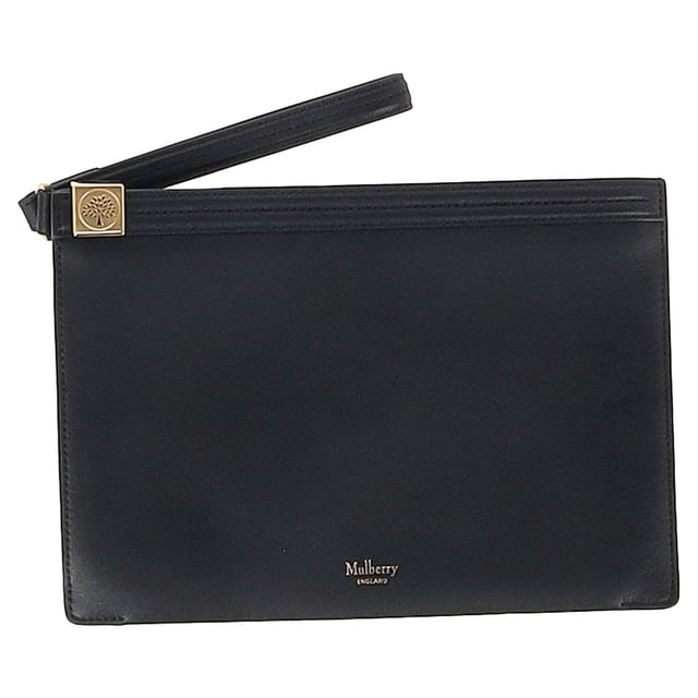 VINTAGE, RRP AS NEW
The Mulberry Tree Logo Zipped Clutch Bag in Black Leather is a sleek, minimalist essential crafted from supple leather and finished with the iconic tree logo in gold-tone hardware. Compact yet roomy enough for your essentials, it’s perfect for day-to-night versatility. **Style tip:** Carry it as a clutch with a little black dress for evening elegance, or use it as a chic pouch inside a larger tote for polished daytime organization.

 Mulberry Tree Logo Zipped Clutch Bag in Black Leather

Condition: Excellent
Signs of wear: No retail tag, No visible sign of wear., 
Packaging: Dust bag
Color: Black
Material: Leather | leather
Size: One Size | One Size
Measurements: Width: 2; Height: 170; Length: 240
SKU: NAPPUGBBA523788W