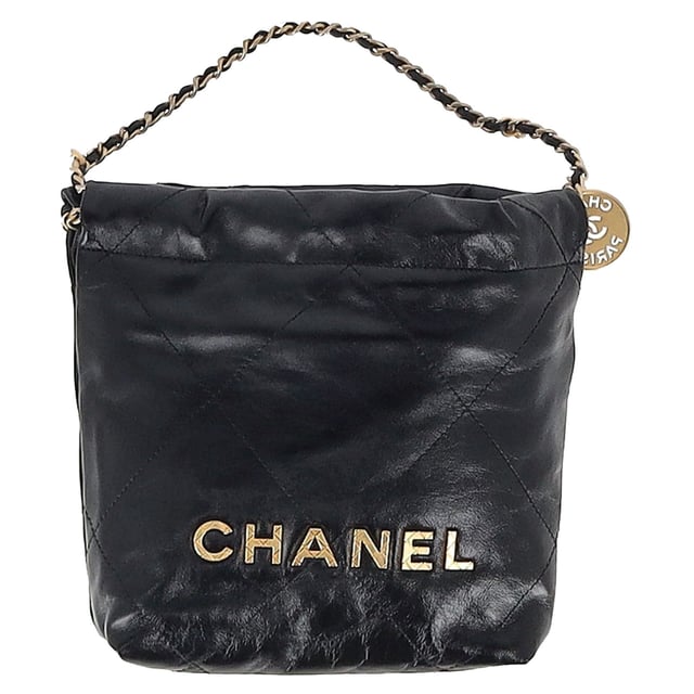 VINTAGE, RRP AS NEW
The Chanel 22 Quilted Mini Bag in Black Shiny Calfskin is the ultimate fusion of heritage and modernity. Crafted in supple diamond-stitched calfskin and finished with aged gold hardware, this mini marvel exudes effortless Parisian chic. The iconic Chanel logo, leather-threaded chain strap, and medallion charm lend a luxurious touch to a piece that’s both light and bold in personality.


Chanel 22 Quilted Mini Hobo Bag in Black Shiny Calfskin Leather
Condition: Excellent
Signs of wear: No retail tag, No visible sign of wear., 
Packaging: None
Color: black
Material: Leather | leather
Size: One Size | One Size
Measurements: Width: 70; Height: 190; Length: 230
SKU: NAPPUGBBA512640W