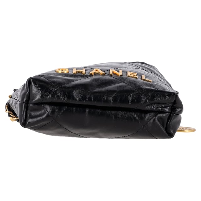 VINTAGE, RRP AS NEW
The Chanel 22 Quilted Mini Bag in Black Shiny Calfskin is the ultimate fusion of heritage and modernity. Crafted in supple diamond-stitched calfskin and finished with aged gold hardware, this mini marvel exudes effortless Parisian chic. The iconic Chanel logo, leather-threaded chain strap, and medallion charm lend a luxurious touch to a piece that’s both light and bold in personality.


Chanel 22 Quilted Mini Hobo Bag in Black Shiny Calfskin Leather
Condition: Excellent
Signs of wear: No retail tag, No visible sign of wear., 
Packaging: None
Color: black
Material: Leather | leather
Size: One Size | One Size
Measurements: Width: 70; Height: 190; Length: 230
SKU: NAPPUGBBA512640W