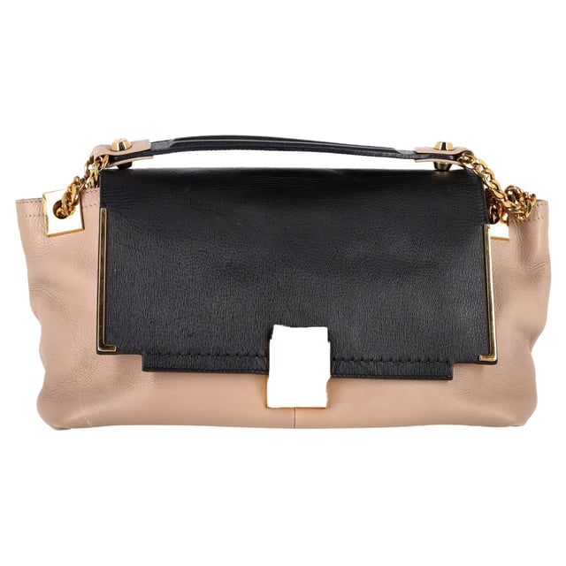 VINTAGE, RRP AS NEW
The Lanvin Large Partition Chain Shoulder Bag in beige and black leather blends timeless elegance with modern functionality, featuring a structured silhouette and gleaming gold-tone chain strap. Its spacious, multi-compartment interior makes it perfect for staying organized in style. **Style tip:** Carry it with a neutral-toned trench and wide-leg trousers for a sophisticated, city-chic look that transitions effortlessly from day to night.

 Lanvin Large Partition Chain Shoulder Bag in Beige and Black Leather

Condition: Excellent
Signs of wear: No retail tag, No visible sign of wear., 
Packaging: None
Color: Beige
Material: Leather |  leather
Size: One Size | One Size
Measurements: Width: 110; Height: 180; Length: 330; Handle drop: 280; Strap length: 0
SKU: NAPPUGBBA524340W