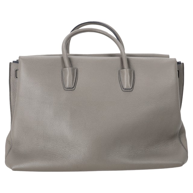 VINTAGE, RRP AS NEW
The MCM Maxim Tote Bag in grey leather combines refined craftsmanship with everyday functionality, featuring a spacious interior and clean, structured lines. Subtle logo detailing and smooth leather make it a versatile choice for both work and weekend wear. **Style tip:** Pair it with a tailored coat and leather sneakers for a sleek, contemporary city look.

 MCM Maxim Tote Bag in Grey Leather

Condition: Excellent
Signs of wear: No visible signs of wear
Packaging: Dust bag
Color: Grey
Material: Leather | leather
Size: One Size | One Size
Measurements: Width: 180; Height: 310; Length: 500; Handle drop: 390; Strap length: -
SKU: MRPPUDEBA525309W