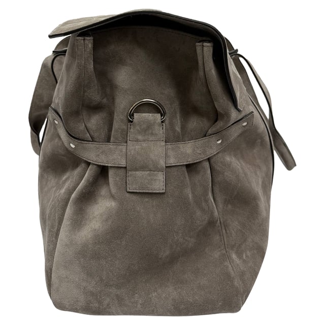 VINTAGE, RRP AS NEW
Elevate your travel style with the Brunello Cucinelli Weekend Bag, expertly crafted in supple grey suede for a luxurious yet laid-back aesthetic. Its spacious interior and refined detailing make it the perfect companion for effortless weekend getaways. **Style Tip:** Pair it with a wool overcoat and leather sneakers for a polished, jet-set-ready look.

 Brunello Cucinelli Weekend Bag in Grey Suede

Condition: Very good
Signs of wear: Lightly used but very well maintained. Minor creasing, light worn corners, light scratches., Minor sign of wear or markings.
Packaging: Dust bag
Color: Grey
Material: Suede | suede
Size: One Size | One Size
Measurements: Handle drop: 550 mm; Strap length: 860 mm
SKU: MRPPUGBBA508690M