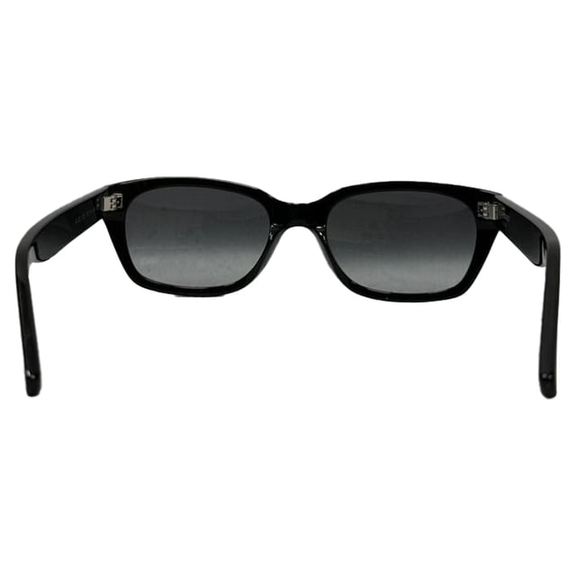 VINTAGE, RRP AS NEW
The Saint Laurent SL522 Square‑Frame Sunglasses in glossy black acetate showcase a bold, sculptural silhouette with refined metal bridge detailing—effortlessly blending modern confidence with Parisian chic. Their oversized square lenses offer optimal sun protection while accentuating sharp jawlines and structured styles. Complete your look by pairing them with a crisp white tee, tailored blazer, and dark wash denim—or slip into a sleek tailored suit and add these sunglasses for a striking, head-turning finishing touch.

Saint Laurent SL522 Square Frame Sunglasses in Black Acetate

Condition: Excellent
Signs of wear:  No sign of wear.
Packaging: None
Color: Black
Material: Plastic
Size: One size
Measurements: Frame width 150 mm Height 155 mm
SKU: MRPPUGBAC511291W