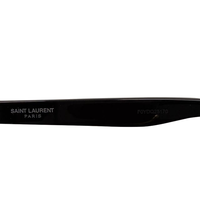 VINTAGE, RRP AS NEW
The Saint Laurent SL522 Square‑Frame Sunglasses in glossy black acetate showcase a bold, sculptural silhouette with refined metal bridge detailing—effortlessly blending modern confidence with Parisian chic. Their oversized square lenses offer optimal sun protection while accentuating sharp jawlines and structured styles. Complete your look by pairing them with a crisp white tee, tailored blazer, and dark wash denim—or slip into a sleek tailored suit and add these sunglasses for a striking, head-turning finishing touch.

Saint Laurent SL522 Square Frame Sunglasses in Black Acetate

Condition: Excellent
Signs of wear:  No sign of wear.
Packaging: None
Color: Black
Material: Plastic
Size: One size
Measurements: Frame width 150 mm Height 155 mm
SKU: MRPPUGBAC511291W