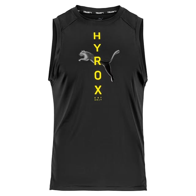 Built for the relentless, the Puma x HYROX Fit Men’s Black Tank Top is designed to power you through the toughest hybrid fitness challenges. Created in collaboration with HYROX, the global fitness race that fuses endurance and strength, this tank is engineered for mobility, moisture management, and race-day performance.
Key Features
HYROX x Puma Co-Branded Design

Features bold HYROX and Puma branding, representing elite functional fitness and competitive grit.

Lightweight Triblend Fabric

A premium blend of polyester, cotton, and viscose offers softness, stretch, and durability for all-day comfort — from warm-up to cooldown.

Moisture-Wicking Performance

Keeps you dry during intense sessions thanks to fabric that draws sweat away from the body.

Sleeveless Athletic Cut

Deep-cut armholes and a relaxed fit offer unrestricted movement for dynamic exercises like sled pushes, burpees, and wall balls.

Crew Neckline

Reinforced collar with soft trim ensures comfort and retains shape through repeated use.

Minimalist Aesthetic with Performance Edge

Matte black base with subtle or bold logo placement (varies by edition), delivering a focused, powerful look.

Ideal for High-Performance Training

Whether you're competing, conditioning, or cross-training, this tank is built to move with you and keep pace with your intensity.