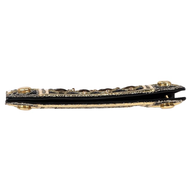 VINTAGE, RRP AS NEW
The Balmain Embellished Flap Clutch Bag in black and gold silk exudes opulence, adorned with intricate embellishments and the house’s signature bold detailing. Its sleek silhouette and luxurious finish make it the perfect statement accessory for evening occasions. **Style tip:** Pair it with a black tailored jumpsuit or a metallic gown to let the clutch shine as the centerpiece of your ensemble.

Balmain Embellished Flap Clutch Bag in Black and Gold Silk

Condition: Excellent
Signs of wear: No retail tag, No visible sign of wear., 
Packaging: None
Color: Black
Material: Silk
Size: One Size | One Size
Measurements: Width: 20; Height: 120; Length: 240
SKU: NAPPUGBSM524364W