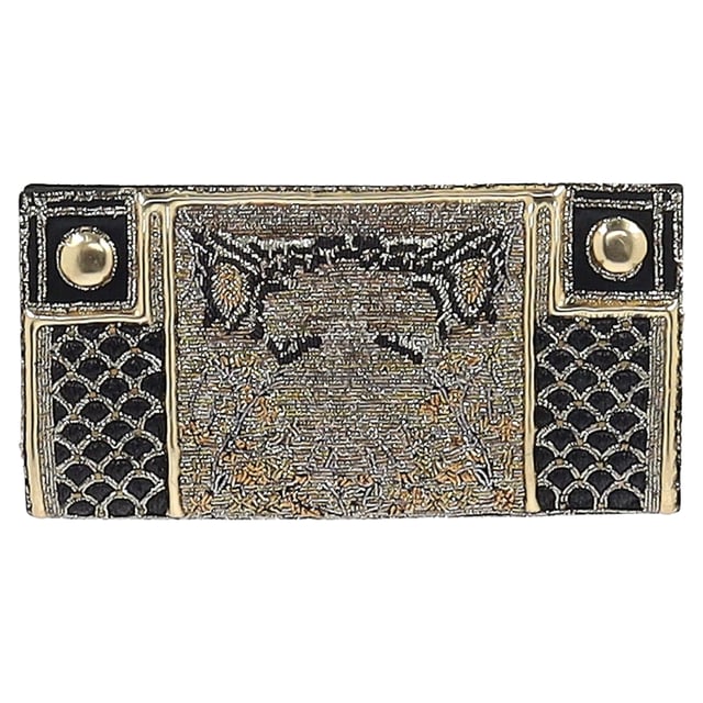 VINTAGE, RRP AS NEW
The Balmain Embellished Flap Clutch Bag in black and gold silk exudes opulence, adorned with intricate embellishments and the house’s signature bold detailing. Its sleek silhouette and luxurious finish make it the perfect statement accessory for evening occasions. **Style tip:** Pair it with a black tailored jumpsuit or a metallic gown to let the clutch shine as the centerpiece of your ensemble.

Balmain Embellished Flap Clutch Bag in Black and Gold Silk

Condition: Excellent
Signs of wear: No retail tag, No visible sign of wear., 
Packaging: None
Color: Black
Material: Silk
Size: One Size | One Size
Measurements: Width: 20; Height: 120; Length: 240
SKU: NAPPUGBSM524364W