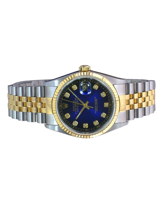 VINTAGE, RRP AS NEW
Details collection: oyster perpetual model name: datejust movement: original rolex automatic case case material: original rolex stainless steel and 18k yellow gold case diameter: 36mm bezel: original rolex bezel style: fluted bezel material: 18k yellow gold dial dial: custom/ aftermarketdial color: bluelnumerical style:  diamond band attachment type: original rolex jubilee bracelet attachment material: stainless steel and 18k yellow gold buckle style: double deployant buckle material: stainless steel measurements: fits a wrist size of 7.5" guarantee our watches come with a 2 years warranty, and includes a certificate of authenticity as well as an appraisal certificate. our warranty does not cover wear and tear, loss, theft, tampering, mistreatment or modification through the addition of subtraction of parts or accessories not supplied by timekeepersvault. all of our watches have been serviced by our in-house certified watch maker, and each watch passes rigorous exams including water pressure test and time-keeping accuracy. this watch currently meets expected time-keeping standards. 
 Rolex Mens Datejust 2 Tone Blue Diamond Dial 18k Fluted Bezel 36mm Watch 16233 
Color: multicolor print
Condition: excellent
Sign of wear: No
SKU: 203950  / 3692916 
 Rolex Mens Datejust 2 Tone Blue Diamond Dial 18k Fluted Bezel 36mm Watch 16233 
Color: multicolor print
Material: Metal | Metal
Condition: excellent
Size: 40
Sign of wear: No
SKU: 444440 / LPXESUSWA203950M / 3692916