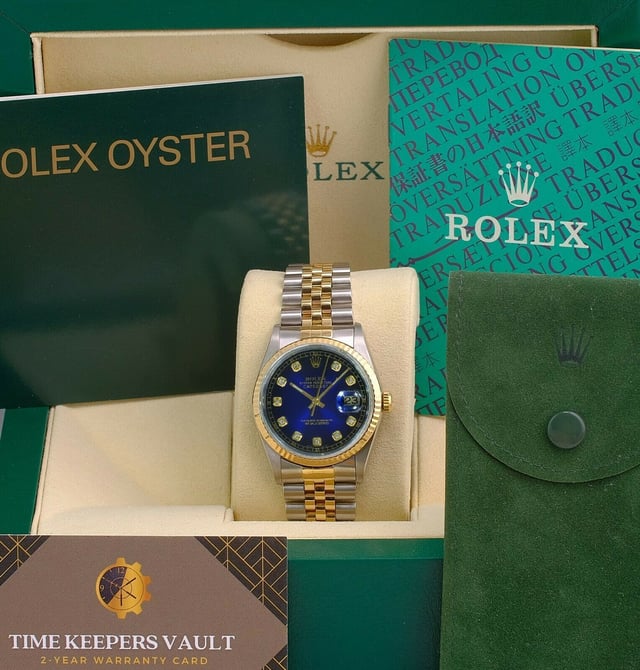 VINTAGE, RRP AS NEW
Details collection: oyster perpetual model name: datejust movement: original rolex automatic case case material: original rolex stainless steel and 18k yellow gold case diameter: 36mm bezel: original rolex bezel style: fluted bezel material: 18k yellow gold dial dial: custom/ aftermarketdial color: bluelnumerical style:  diamond band attachment type: original rolex jubilee bracelet attachment material: stainless steel and 18k yellow gold buckle style: double deployant buckle material: stainless steel measurements: fits a wrist size of 7.5" guarantee our watches come with a 2 years warranty, and includes a certificate of authenticity as well as an appraisal certificate. our warranty does not cover wear and tear, loss, theft, tampering, mistreatment or modification through the addition of subtraction of parts or accessories not supplied by timekeepersvault. all of our watches have been serviced by our in-house certified watch maker, and each watch passes rigorous exams including water pressure test and time-keeping accuracy. this watch currently meets expected time-keeping standards. 
 Rolex Mens Datejust 2 Tone Blue Diamond Dial 18k Fluted Bezel 36mm Watch 16233 
Color: multicolor print
Condition: excellent
Sign of wear: No
SKU: 203950  / 3692916 
 Rolex Mens Datejust 2 Tone Blue Diamond Dial 18k Fluted Bezel 36mm Watch 16233 
Color: multicolor print
Material: Metal | Metal
Condition: excellent
Size: 40
Sign of wear: No
SKU: 444440 / LPXESUSWA203950M / 3692916