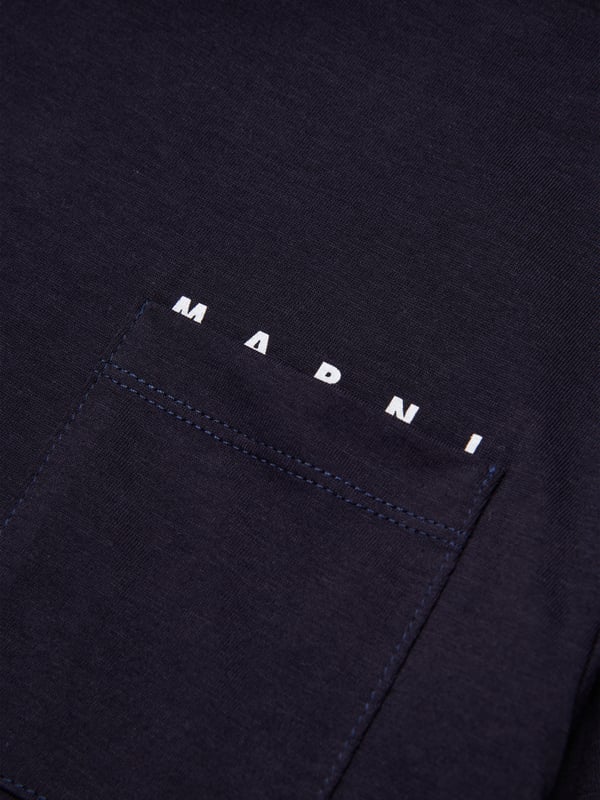 Marni's vintage archives are incorporated with care and spellbinding craftsmanship. This unisex short sleeve t-shirt has an iconic logo and small pocket on the front. Short Sleeves Crew Neck Cotton Jersey Straight Hem 100 Cotton