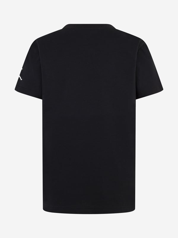 Introducing the SS2025 Jordan Boys Sports Graphic T-Shirt in sleek black, a quintessential addition to any young wardrobe. Crafted with pinnacle quality, this piece is not just a t-shirt, it's a style statement. Sophisticated Design Features a dynamic, sports-inspired graphic that captures the essence of youthful energy. Luxurious Comfort Expertly made from premium fabric to ensure softness and durability for all-day wear. Versatile Appeal Perfect for both sports and casual outings, ensuring your boy always looks his best. Elevate his style with this exclusive Jordan piece.