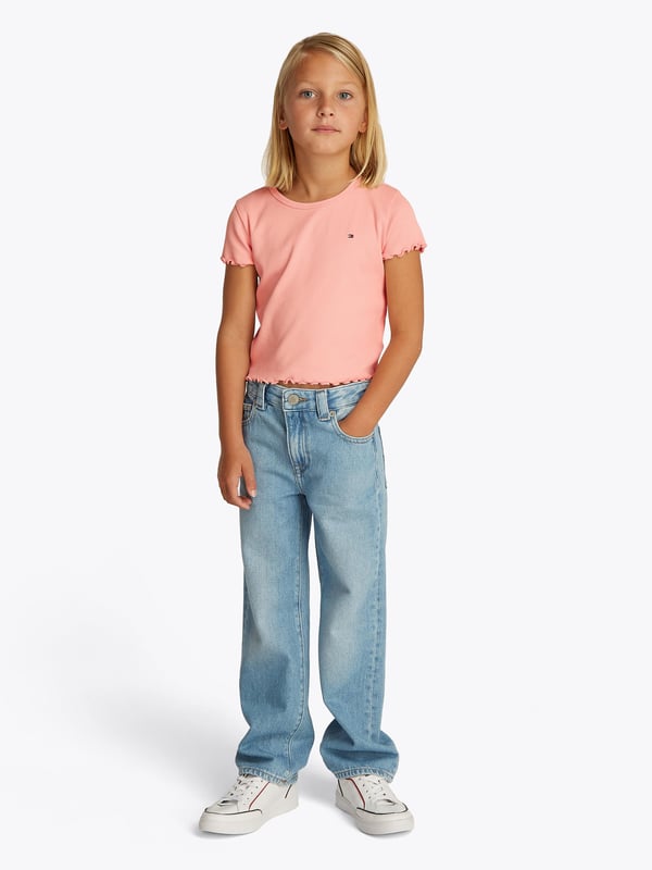 Introducing the exquisite Tommy Hilfiger Girls Essential Rib Top in Pink a quintessential addition for the discerning young lady's SS2025 wardrobe. Elegantly Tailored Crafted with precision, this top features a chic, snug fit that accentuates a graceful silhouette. Vibrant Pink Hue Radiating charm, its delightful pink shade ensures your girl shines on every occasion. Premium Fabric Soft, stretchable ribbed fabric guarantees comfort while offering durability for all-day play.Refine her style with Tommy Hilfiger's timeless elegance. Perfect for any event where fashion and comfort must go hand-in-hand.